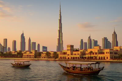 Dubai skyline with Burj Khalifa and traditional dhow boats